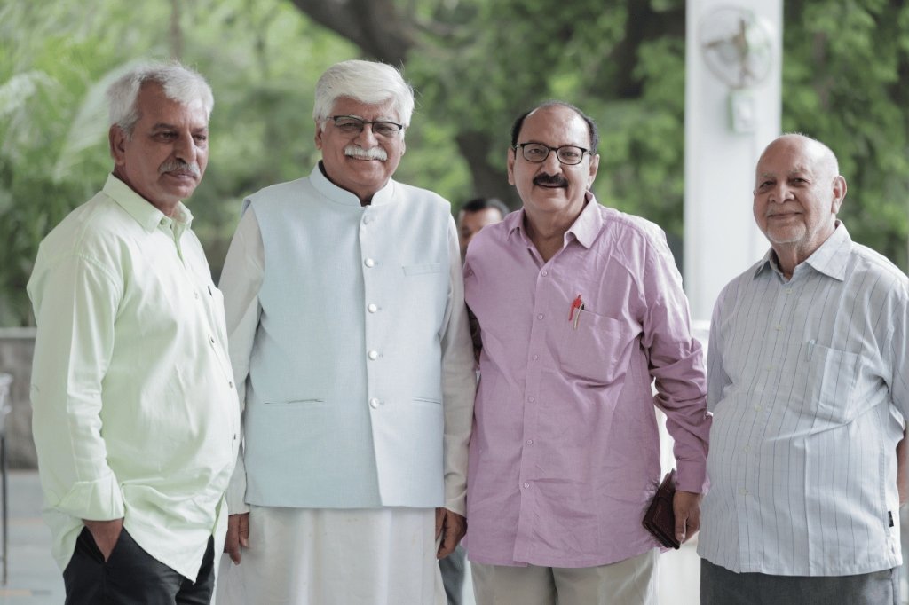 Four men posing
